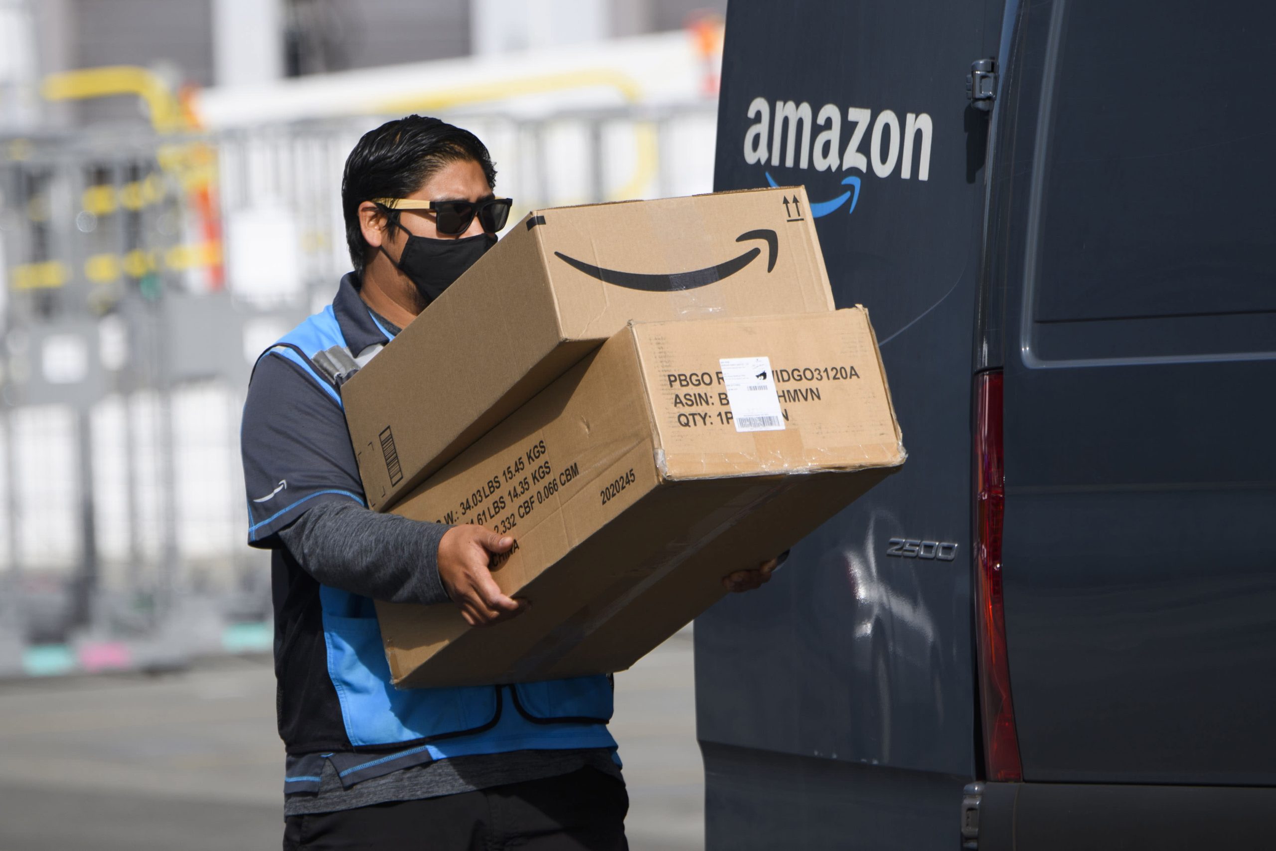 Amazon Delivery Uniform-Wearing Man Committing Bank Fraud in California