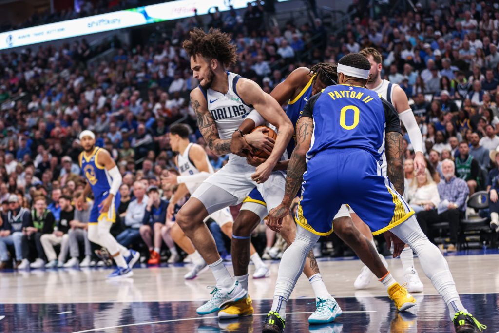 Warriors' Defensive Stand Leads to Victory Against Mavericks