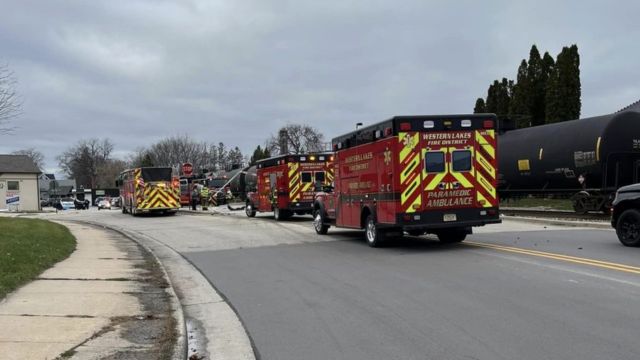 One Person is Rescued From a Vehicle Following a Collision With a Train, Closing Highways in Wisconsin