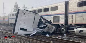 Train Hits Stuck Truck in Auburn; Driver and Passenger Escape in Time